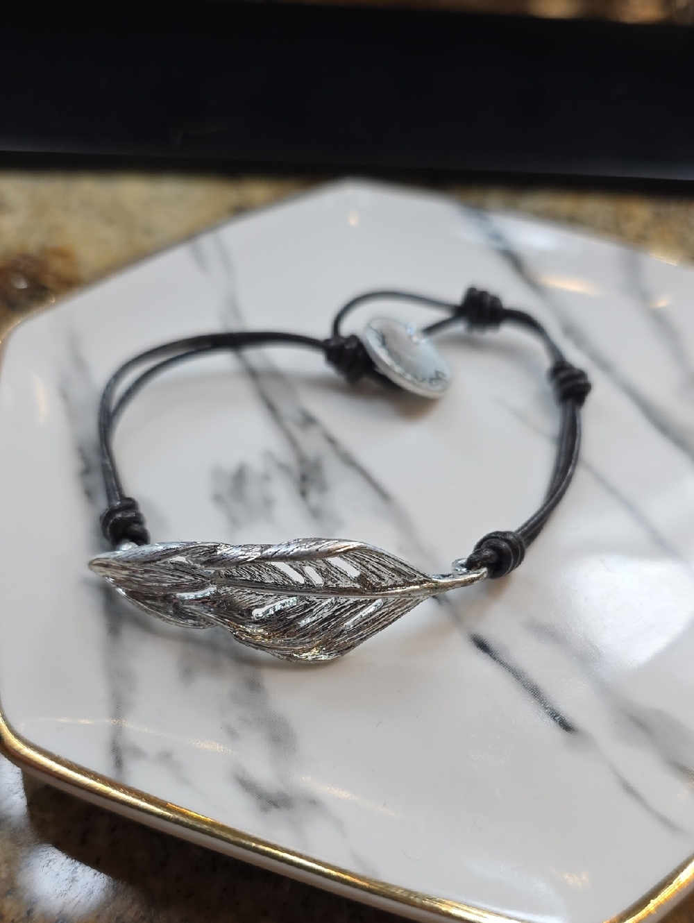 Chloe + Isabel Silver Feather Cord Bracelet with Black Cord